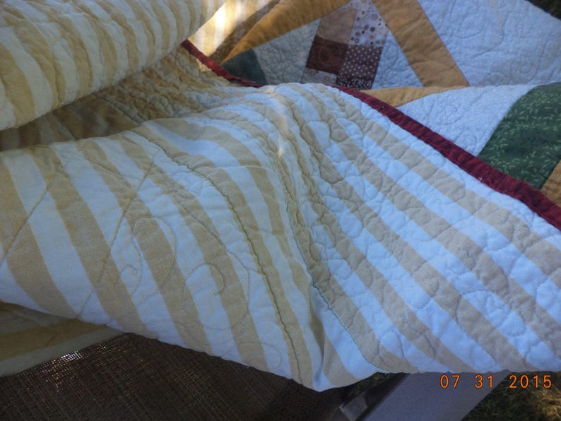Under The Apple Tree scrappy quilt patchwork quilt in greens red gold quilt wall hanging small quilted throw