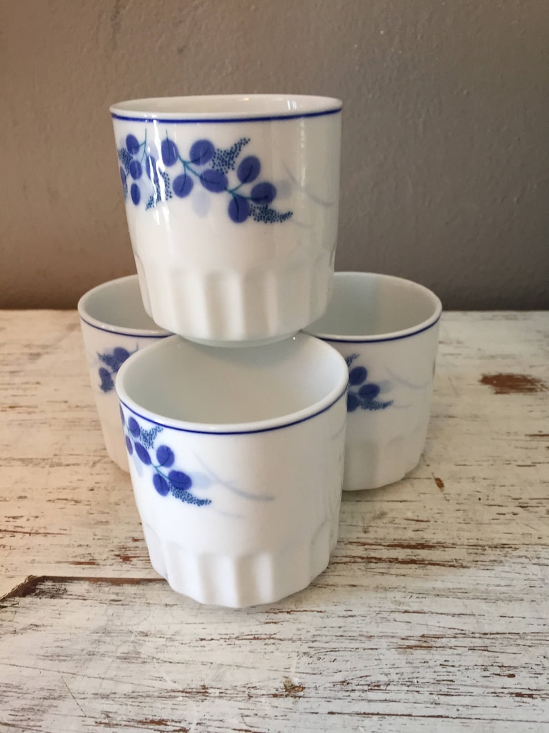 vintage sake cups Set of 4 white and blue ceramic Japanese tea or saki cups marked Lhong Tao ribbd tea cups white with blue leafy flowers