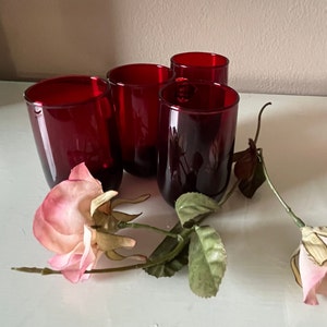 May include: A rustic wooden sign with the text "Welcome to our porch" in white lettering. The sign features a distressed finish and a simple, inviting design, perfect for outdoor decor.