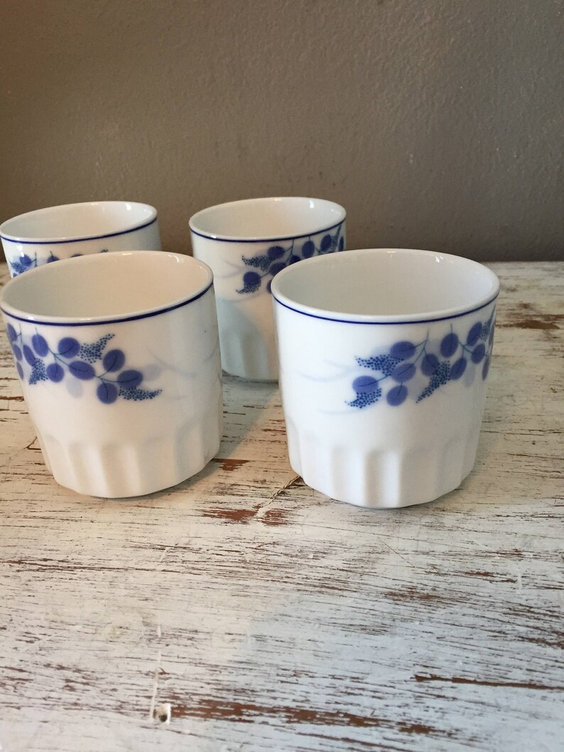 vintage sake cups Set of 4 white and blue ceramic Japanese tea or saki cups marked Lhong Tao ribbd tea cups white with blue leafy flowers