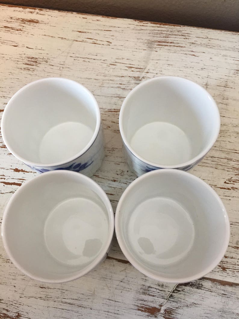 vintage sake cups Set of 4 white and blue ceramic Japanese tea or saki cups marked Lhong Tao ribbd tea cups white with blue leafy flowers