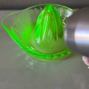 Vaseline glass juicer /green glow uranium glass juicer / early century era depression glass green juicer / green depression glass