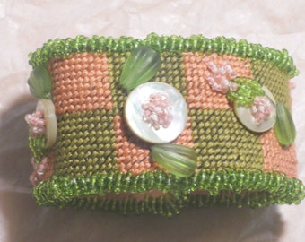 Pink and Green Needlepoint Bracelet\/w Mother of preal buttons,press glass,seed beads