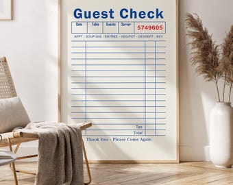 May include: A framed print featuring a "Guest Check" design in blue text on a cream background. The print includes fields for date, table, guests, server, and a unique number. The words "Thank You - Please Come Again" are at the bottom.