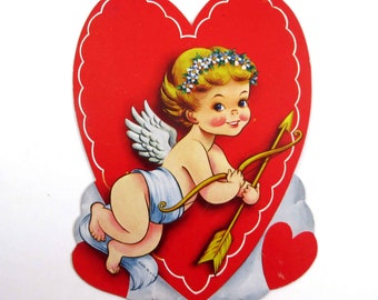 vintage coeur Saint-Valentin découpé avec arc de Cupidon et nuages fléchés