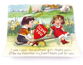 Vintage Antique Fold Down Valentine Card with Boy and Girl on See Saw Daffodils House