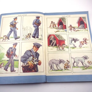 May include: A vintage children's book with illustrations of a postman delivering mail and dogs playing. The book is titled "Look and Tell" and has a blue cover.