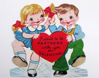 Carte de Saint-Valentin pour enfants vintage inutilisée avec un garçon et une fille mignons dansant