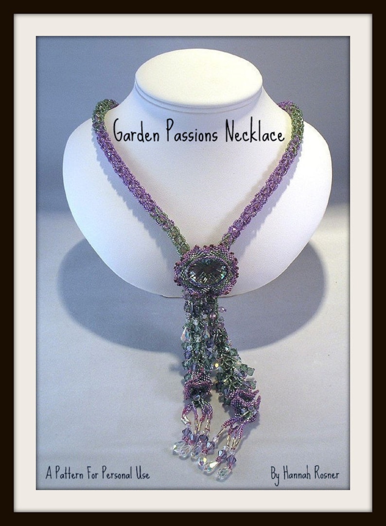 May include: A beaded necklace on a white bust form. The necklace is primarily purple and green, with a central oval pendant and a beaded tassel. The text "Garden Passions Necklace" is above the necklace. The text "A Pattern For Personal Use" and "By Hannah Rosner" are below.