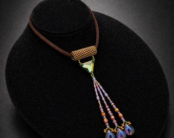 Seed beaded pendant with Japanese Toho Beads, Swarovski crystals and Czech beads by Hannah Rosner Designs