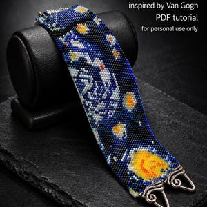 May include: A wide beaded bracelet featuring a dark blue, black, white, and yellow pattern reminiscent of a starry night sky. The text reads: Starry Night bracelet inspired by Van Gogh PDF tutorial for personal use only by Hannah Rosner.