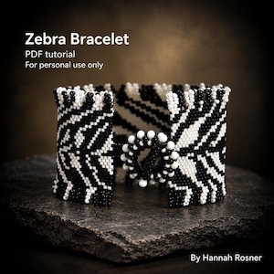 May include: A beaded bracelet featuring a black and white zebra stripe pattern with a circular toggle clasp. The text on the image reads: Zebra Bracelet, PDF tutorial, For personal use only, By Hannah Rosner.