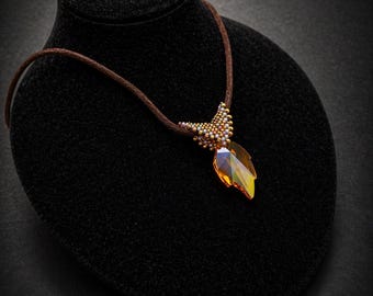 Seed beaded pendant with Japanese Toho Beads and Swarovski crystal by Hannah Rosner Designs