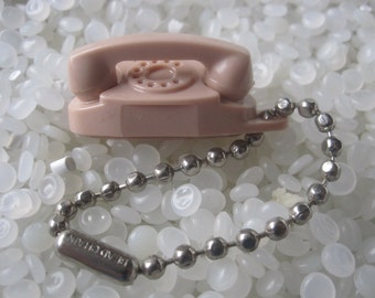 vintage key chain , mini princess phone, pale blush, tannish, souvenir, princess phone, keychain collection ,