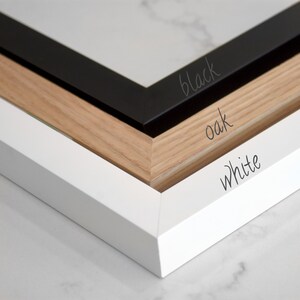 Solid wood framed art options. Shown in black, oak and white options.
