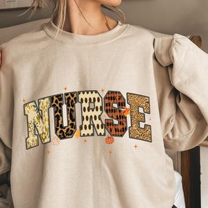 Nurse Fall Sweatshirt, Autumn Nurse Crewneck, Pumpkin Spooky Season Nursing Gift, Cute Healthcare Worker Sweater