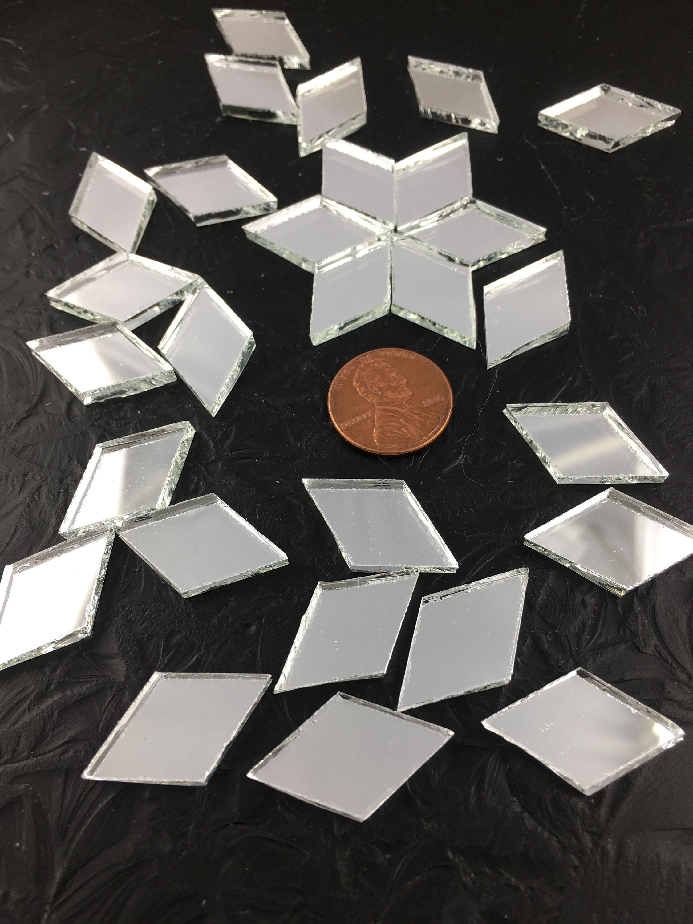 I have 12k mirror disco tiles left over from a project. What would you make  ? : r/crafts