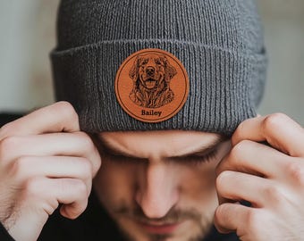 May include: A gray beanie with a brown leather patch featuring a dog's head and the name "Bailey".