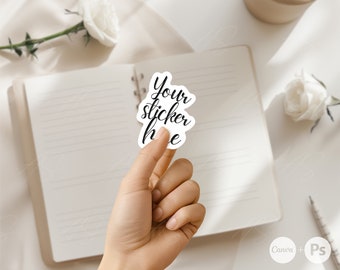 May include: A white sticker with black text that reads "Your sticker here" on a white background.