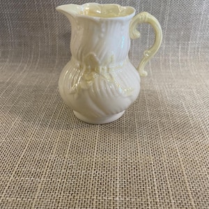 Belleek Limpid Yellow Creamer with 5th Date Mark in Green
