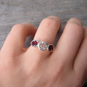 Three stone Garnet and White Topaz Ring, January Birthstone Ring, Bezel Set Sterling Silver Gemstone Ring