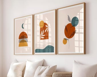 May include: Three abstract art prints with a minimalist design featuring geometric shapes, leaves, and a crescent moon in shades of orange, yellow, blue, and brown.