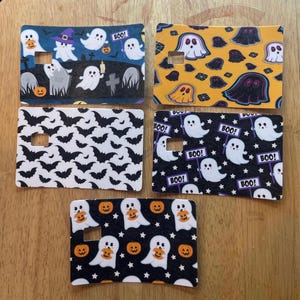 Debit Card Skins- spooky styles – ghosts, pumpkins, and tombstones.