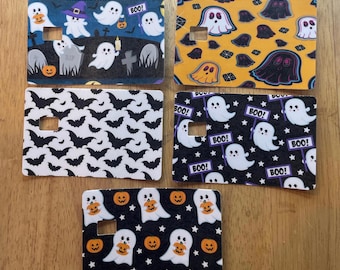 Debit Card Skins- spooky styles – ghosts, pumpkins, and tombstones.