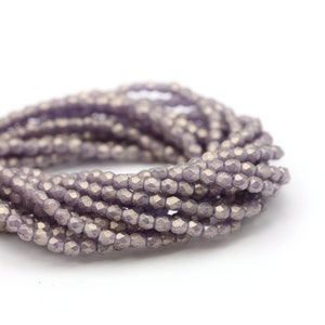 Perles de verre tchèques, polies au feu, rondes facettées, 2 mm, tanzanite dorée suédée (50) CZF967