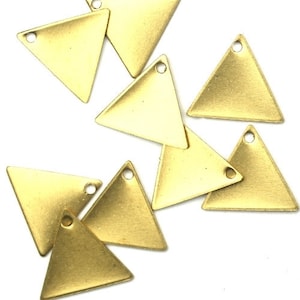 May include: A set of ten gold-toned triangle charms with a hole at the top. The charms are made of metal and have a shiny finish.