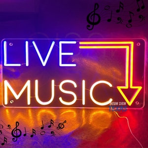 May include: A neon sign with the words "LIVE MUSIC" in white, with a yellow arrow pointing down. The sign has a purple and orange background, with musical notes scattered around. The sign is rectangular.