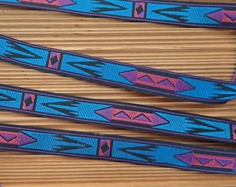 APACHE narrow Jacquard trim in cadet blue, purple, red and black. Sold by the yard. 7/16 inch wide. 995-C. South Western trim