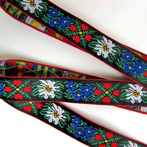 EDELWEISS & HEARTS narrow Jacquard trim White Blue red green yellow on black. Red edges. Sold by the yard. 5/8 inch wide. 9562A Bavarian image 1