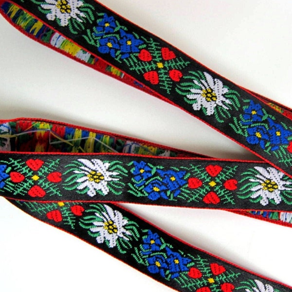 EDELWEISS & HEARTS narrow Jacquard trim White Blue red green yellow on black. Red edges. Sold by the yard. 5/8 inch wide. 956(2)-A Bavarian