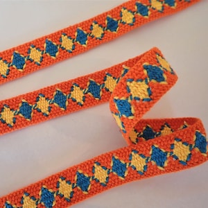 Rustic VOLOS Jacquard trim in turquoise, yellow on orange. Fully reversible. Sold by the yard. 6/8 inch wide. 2095-A Native style trim. image 1