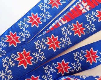 SCANDINAVIAN SNOWFLAKES Jacquard trim in Red, White on Royal Blue. 1 1/8 inch wide. V162-B, traditional embroidered trim