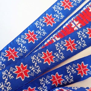 SCANDINAVIAN SNOWFLAKES Jacquard trim in Red, White on Royal Blue. 1 1/8 inch wide. V162-B, traditional embroidered trim