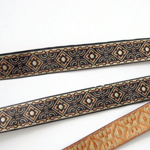 BRONZE AGE narrow Jacquard trim in brown and tan on black. Sold by the yard. 5/8 inch wide. 582-C  Geometric trim
