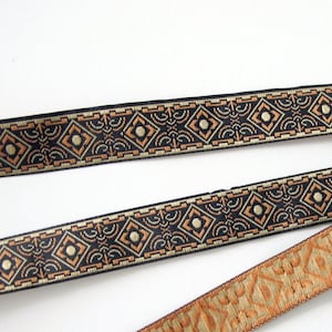 BRONZE AGE narrow Jacquard trim in brown and tan on black. Sold by the yard. 5/8 inch wide. 582-C  Geometric trim