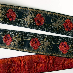 deep red roses on a black jacquard trim with gold details in pointille