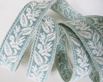 Reversible CAMEO LEAVES Jacquard trim in natural ivory and sea foam green. Sold by the yard. 7/8 inch wide. 280-B