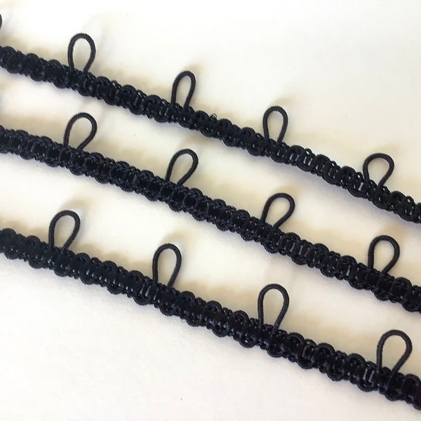 Black Stretch BUTTON LOOP elastic braid . Sold by the yard. 1/2 inch wide. 850-450B. Stretch loop edge braid