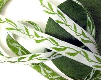 BEANSTALK  narrow Jacquard trim with green leaves on white. Sold by the yard. 1/2 inch wide. 858-A