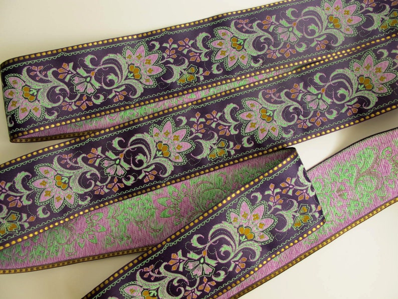 wide purple textile jacquard ribbon trim with rich florals in green, mustard yellow, lavender mauve and metallic gold threads, over 2 inches wide