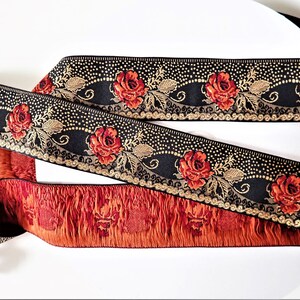 deep red roses on a black jacquard trim with gold details in pointille