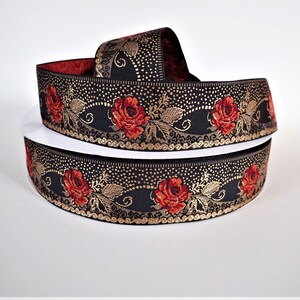 deep red roses on a black jacquard trim with gold details in pointille