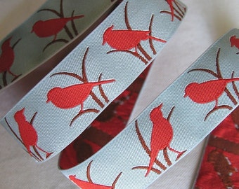 BIRDIES Remnants Jacquard ribbon, red bird silhouettes on light blue. 1 inch wide. 812-B. Red Silhouette birds. REMNANTS