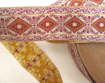 QUEEN of SHEEBA Jacquard trim in Red, raspberry, mustard, gold on white. Sold by the yard. 1 1/4 inch wide. 710-A. Geometric and scrolls