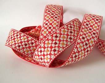 DAISY FIELD Jacquard trim. Wine red, yellow, white on red. Sold by the yard. 1 1/2 inch wide. 2036-B. Bavarian floral trim