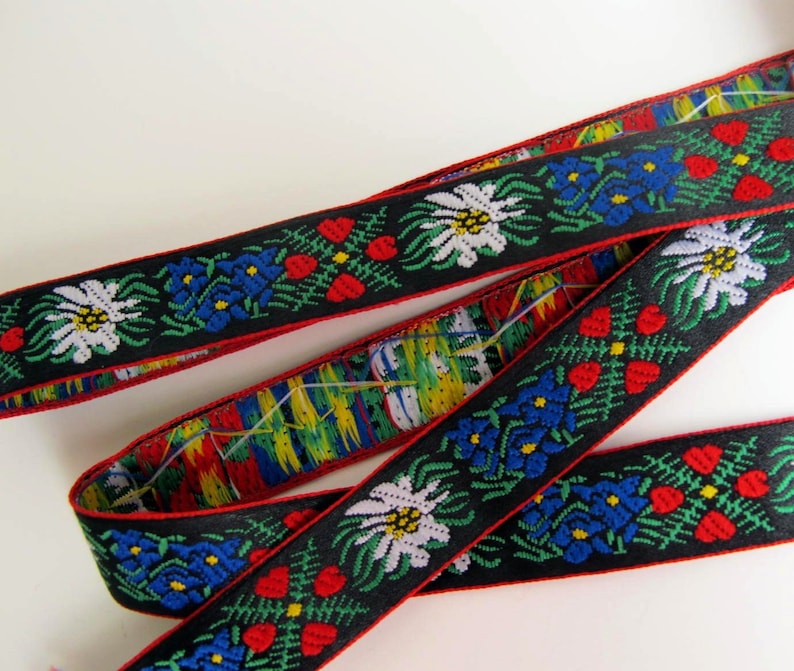 EDELWEISS & HEARTS narrow Jacquard trim White Blue red green yellow on black. Red edges. Sold by the yard. 5/8 inch wide. 9562A Bavarian image 3